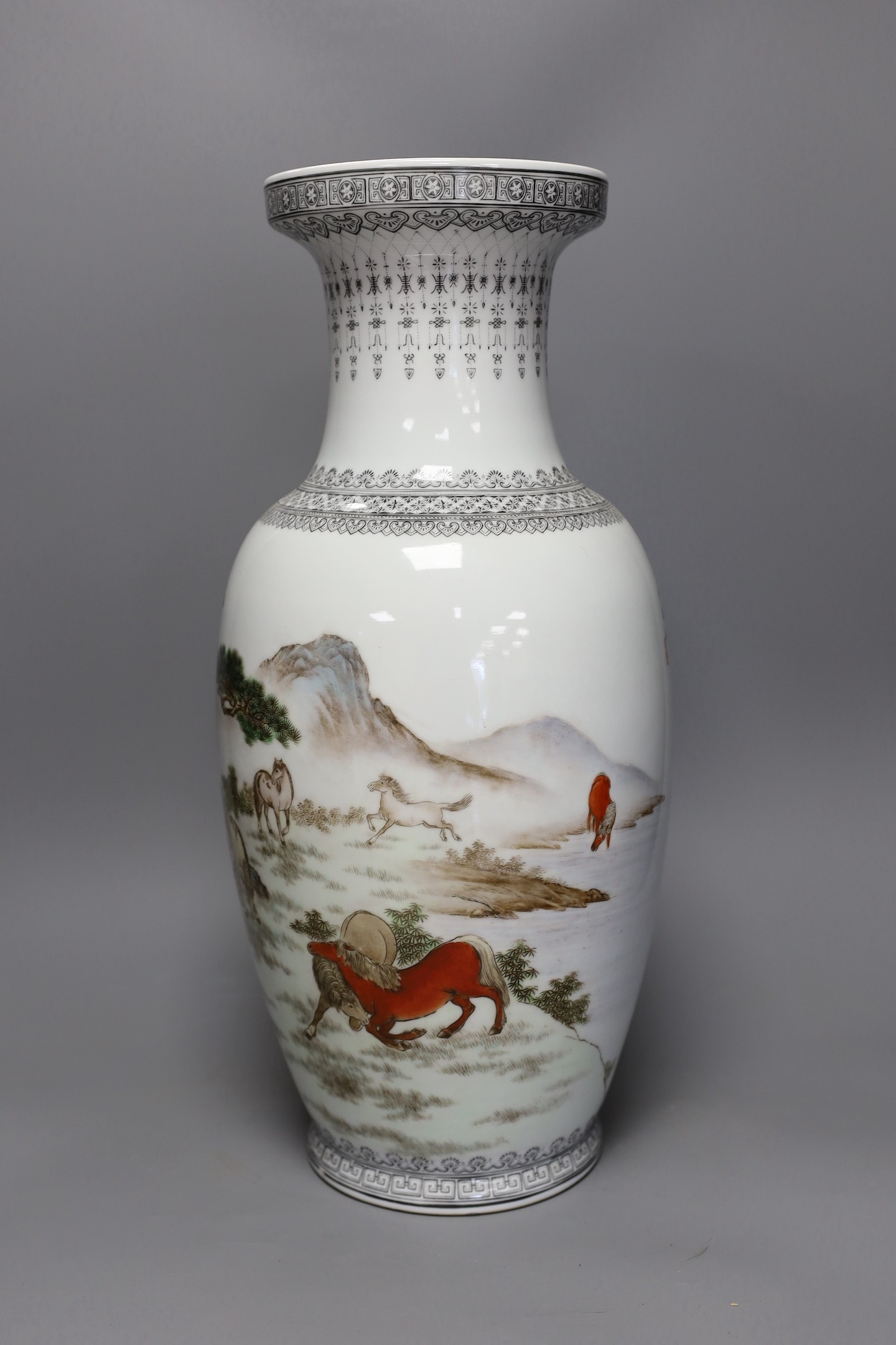 A Chinese baluster ‘eight horses’ vase, 47 cms high